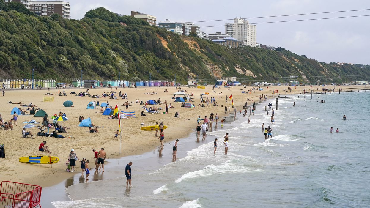 People enjoying the hot weather on Bournemouth beach after temperatures topped 40C
