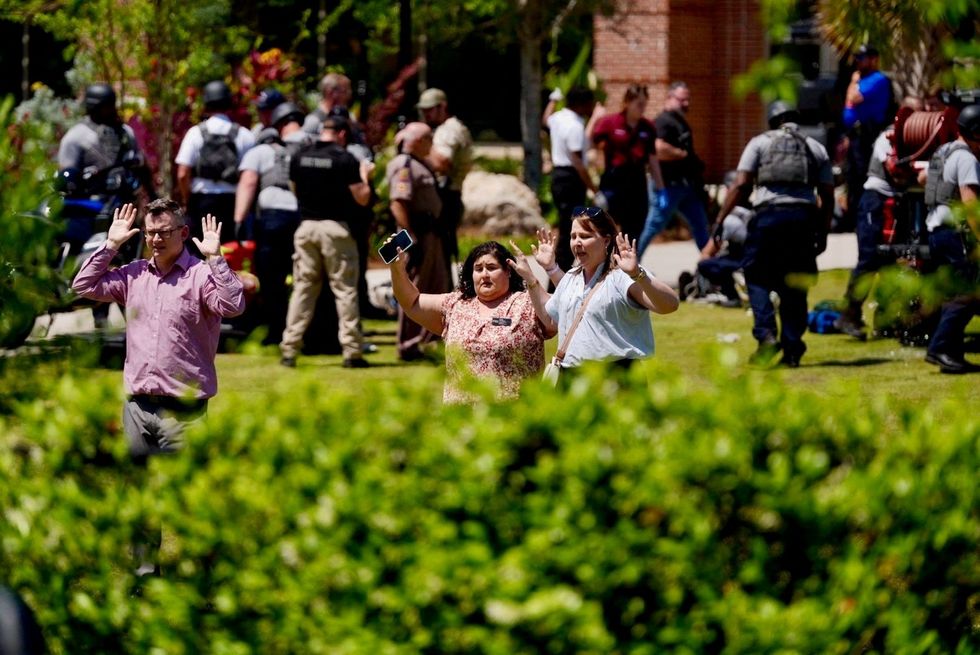 People evacuate Florida State University (FSU) campus
