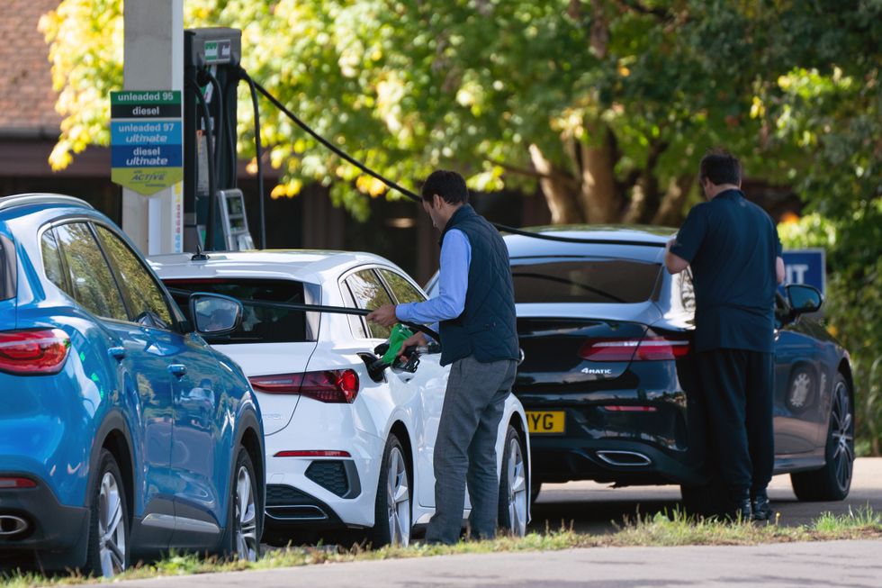 People filling up at the petrol station