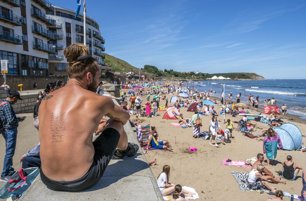 People flocked to Scarborough beach, North Yorkshire, revelling in the sunshine