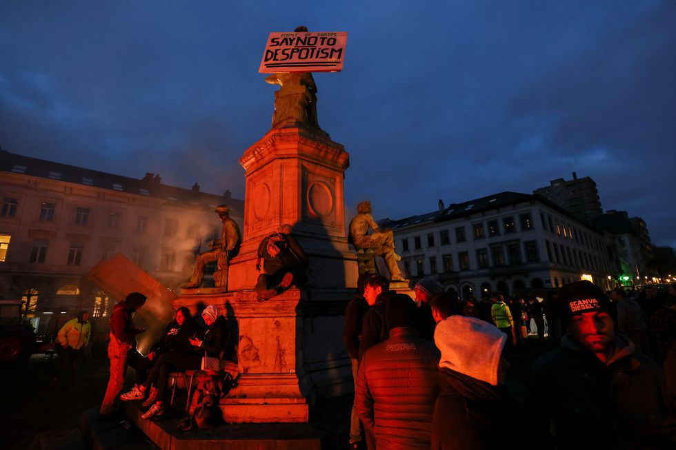 People gather as Belgian farmers protest in Brussels, Belguim