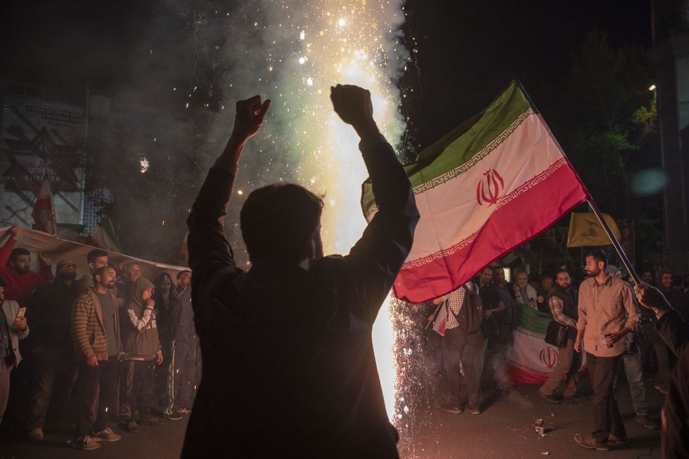 People gather in support of the Islamic Revolutionary Guard Corps' attack on Israel