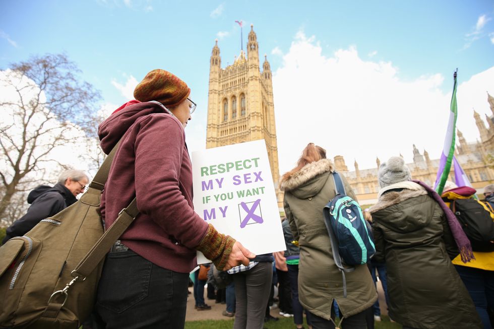 People gather in Victoria Gardens, Westminster as Caroline Ffiske of Women Uniting, Heather Binning from the Women's Rights Network and Maya Forstater Sex Matters from three of the country's largest campaign groups on women's rights - Women Uniting, Sex Matters and Women's Rights Network (WRN) - launch the 'Respect my Sex if you want my X' campaign, which is calling for as many members of public - female and male, and across all party lines - to quiz their politicians about their stance on women's rights and trans issues. Picture date: Saturday April 2, 2022.