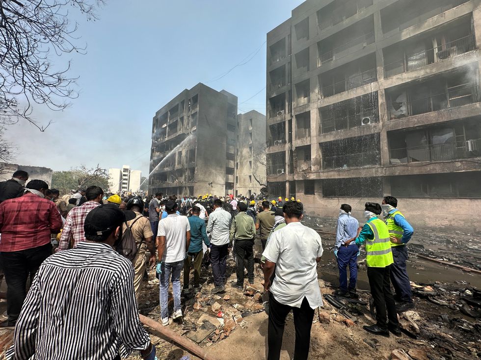 People gather near the site where an Air India plane crashed in Ahmedabad\u200b