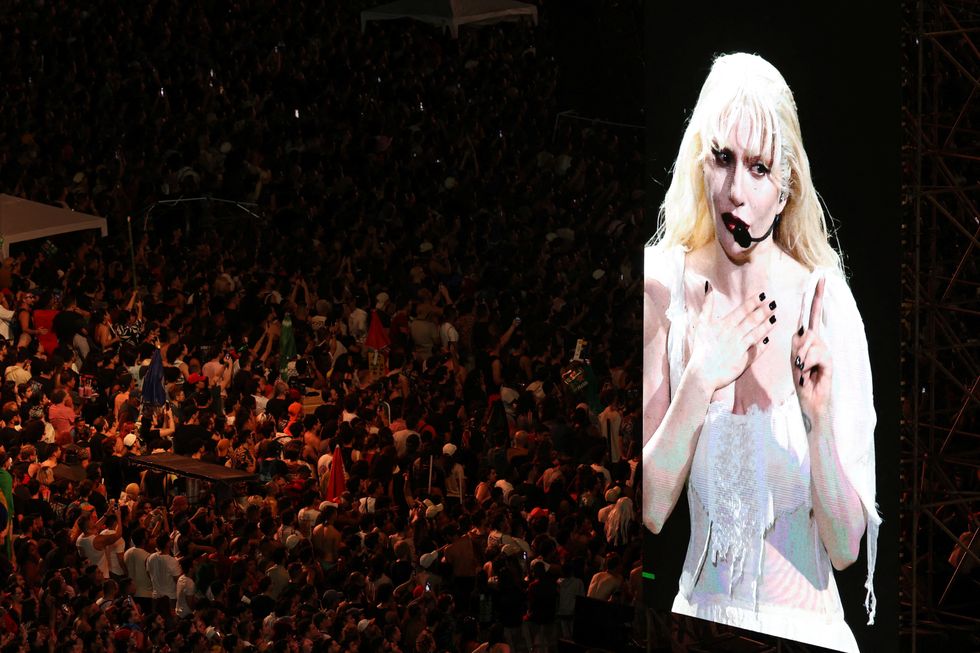 People gather to attend Lady Gaga's open concert