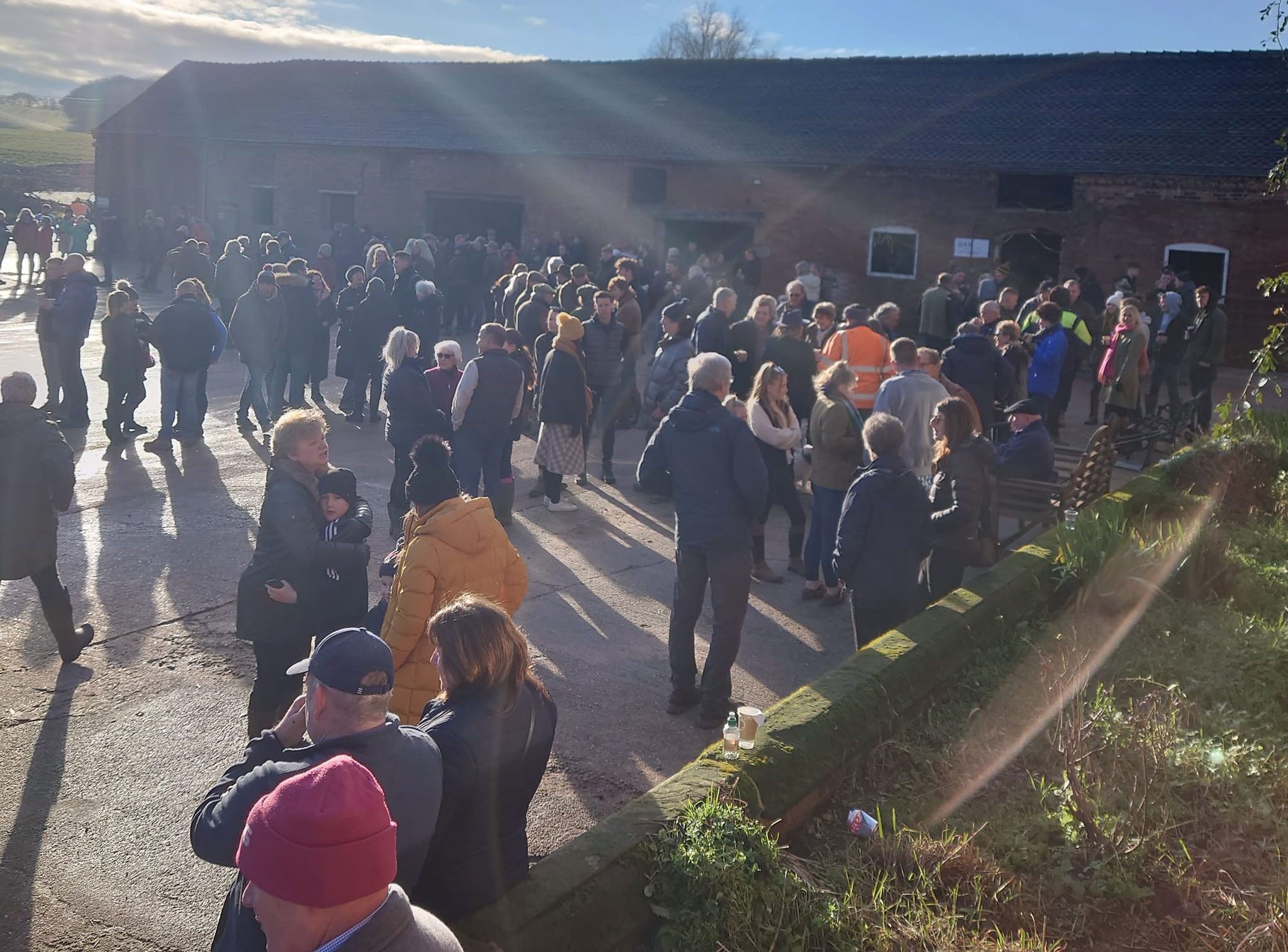 People in the farmyard ahead of the hunt