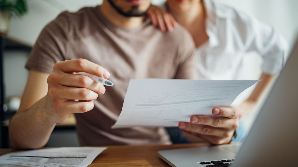 People look at energy bills