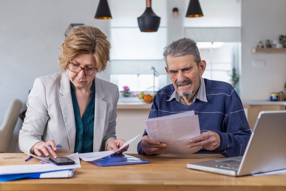 People look at Power of Attorney documents 