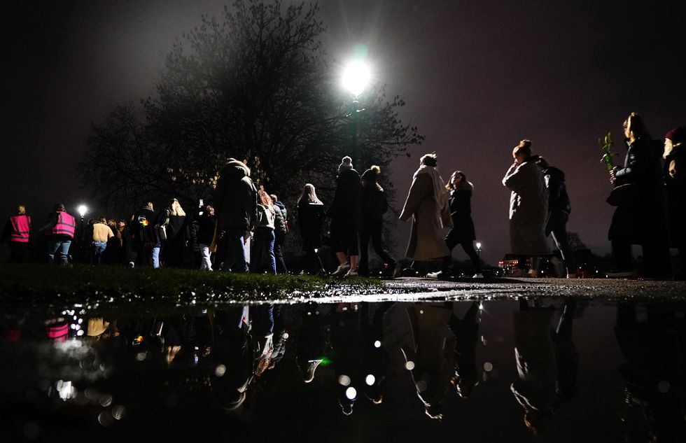 People march through Clapham Common in south London, to mark the first anniversary of the murder of Sarah Everard. The 33 year old was raped and killed by serving Met officer Wayne Couzens as she walked home in south London on March 3 last year. Picture date: Thursday March 3, 2022.