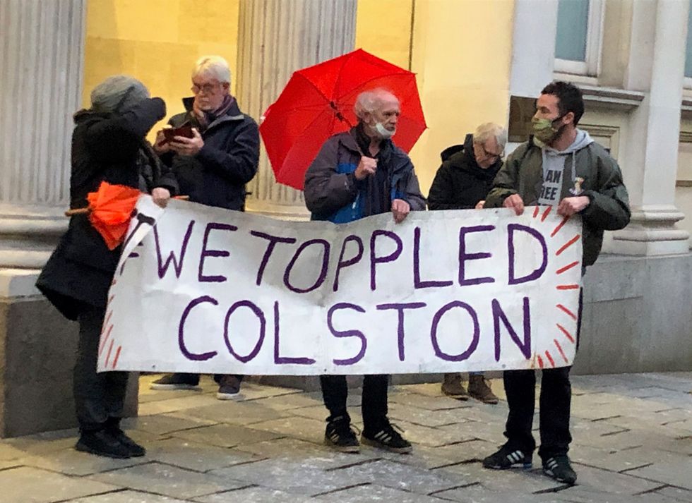 People outside Bristol Crown Court after Jake Skuse, Rhian Graham, Milo Ponsford and Sage Willoughby have been cleared of criminal damage for pulling down a statue of slave trader Edward Colston during a Black Lives Matter protest in June 2020.