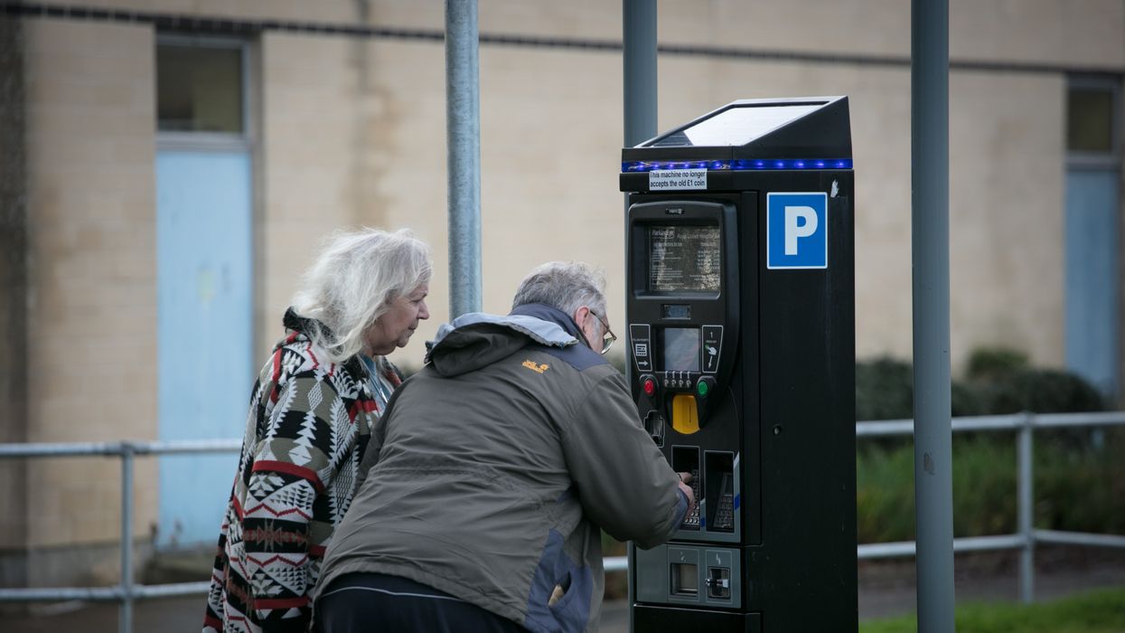 People paying for parking