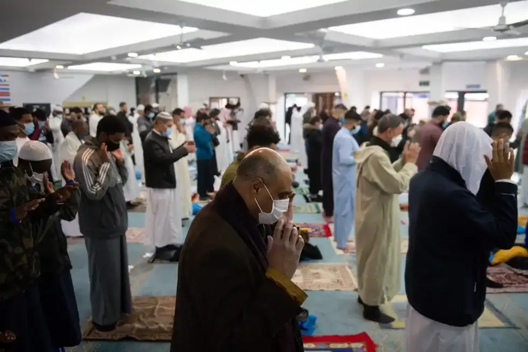 People praying in a mosque