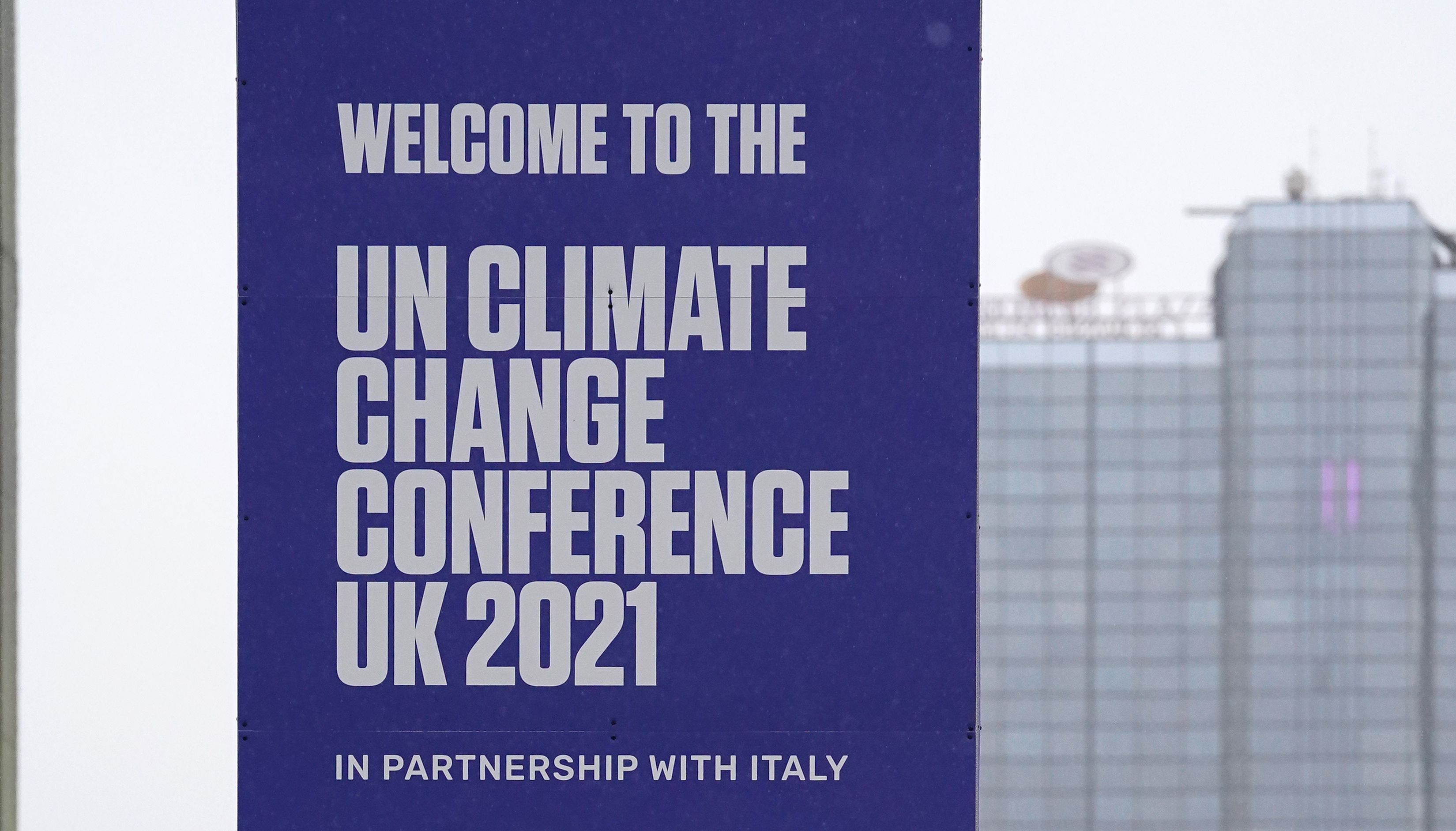 People queue at the Scottish Event Campus in Glasgow where Cop26 is being held.