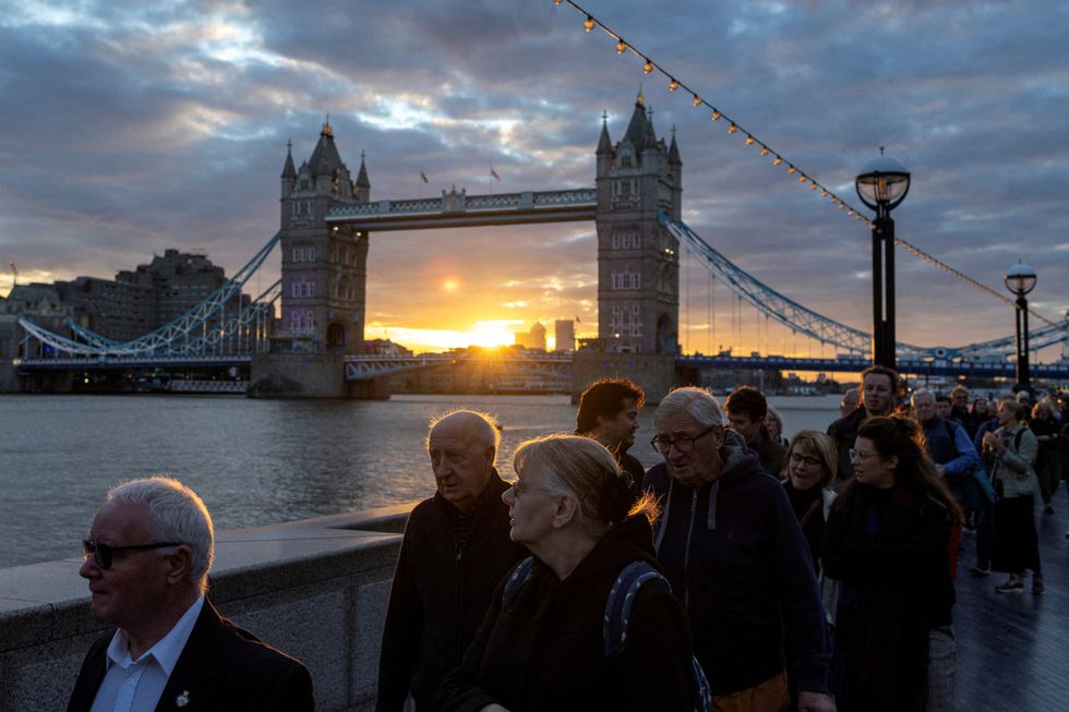 People queue near Tower Bridge to pay their respects following the death of Britain's Queen Elizabeth, in London, Britain, September 16, 2022. REUTERS/Alkis Konstantinidis TPX IMAGES OF THE DAY