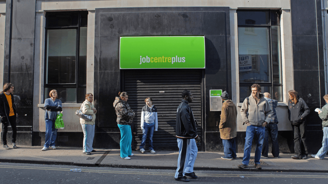 People queue outside a Job Centre