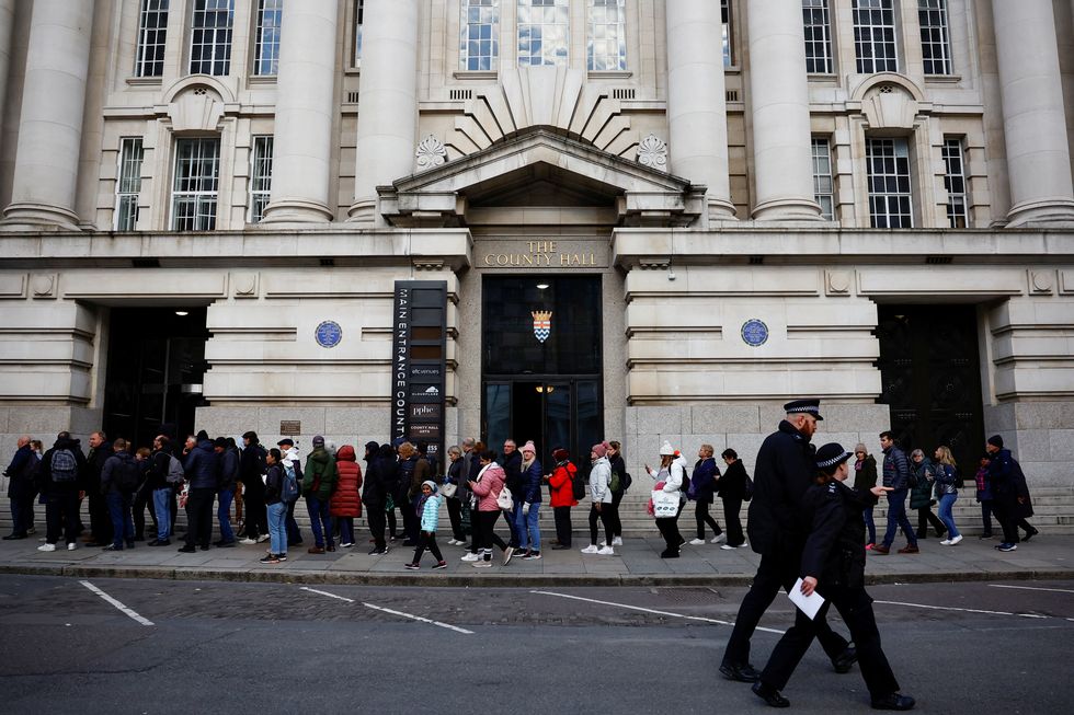 People queue to pay their respects following the death of Britain's Queen Elizabeth, in London, Britain, September 16, 2022. REUTERS/Sarah Meyssonnier