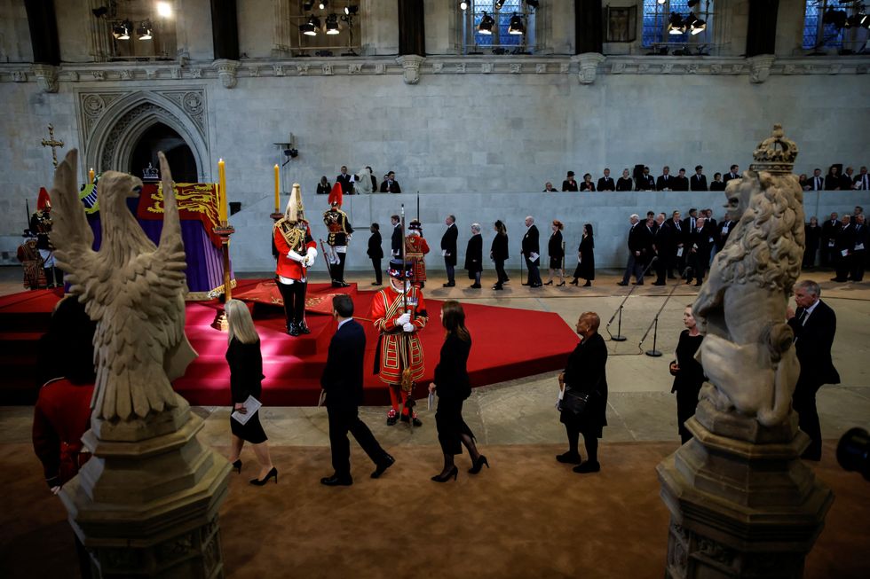 People queue to view the coffin of Queen Elizabeth II as it lies on the catafalque in Westminster Hall, London. Picture date: Wednesday September 14, 2022.