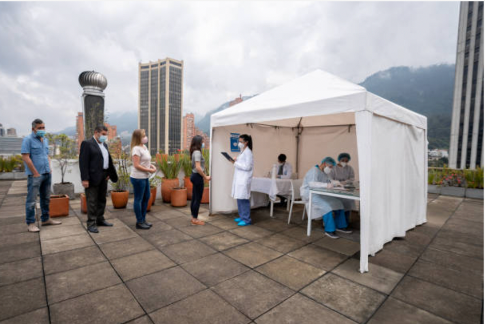 People queuing to get vaccinated