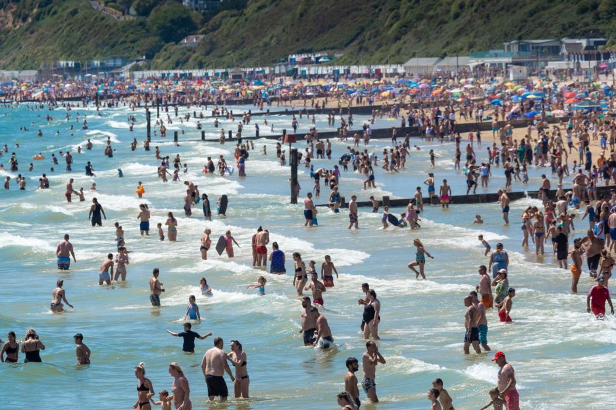 People swimming in sea