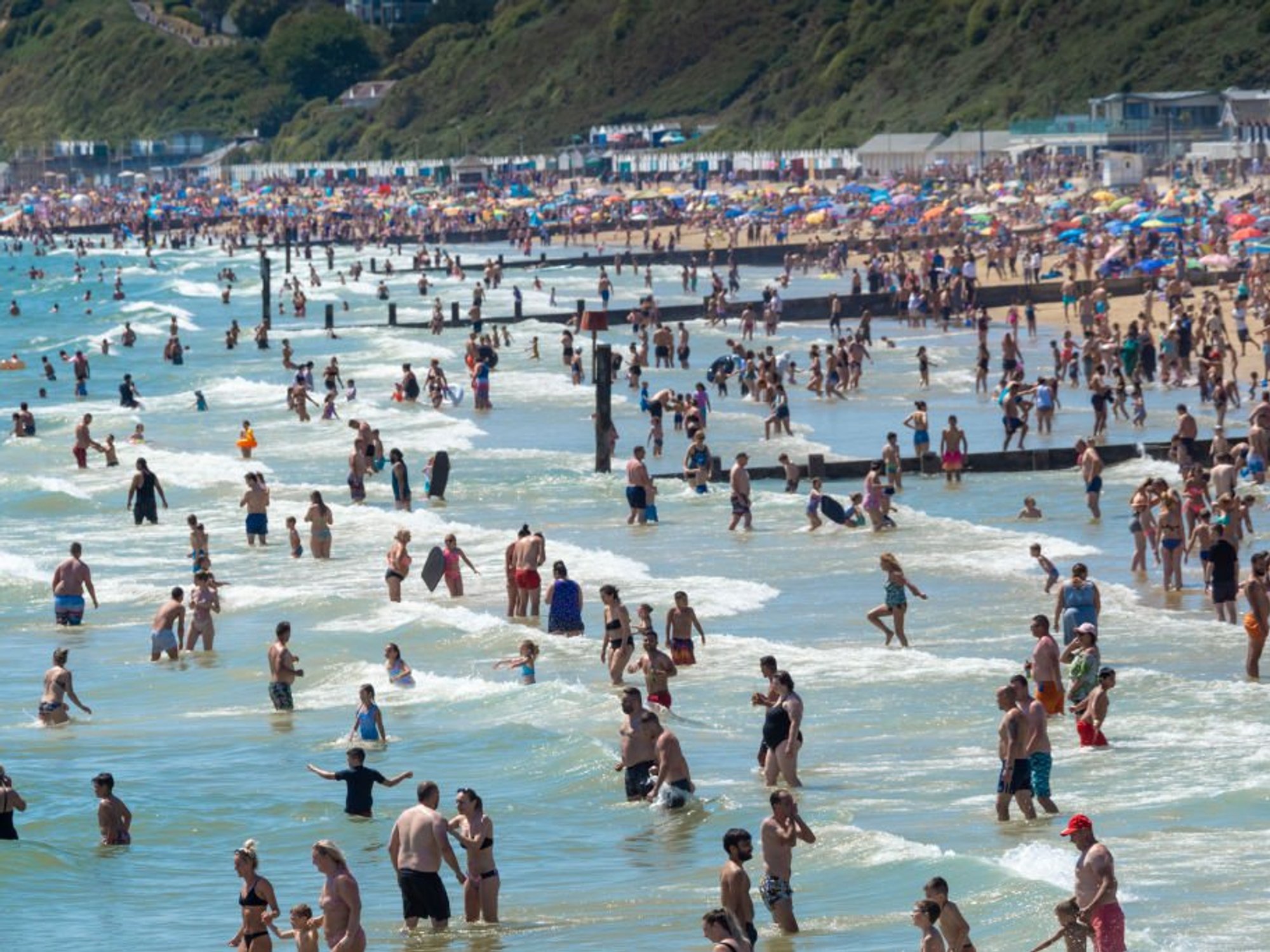 People swimming in sea