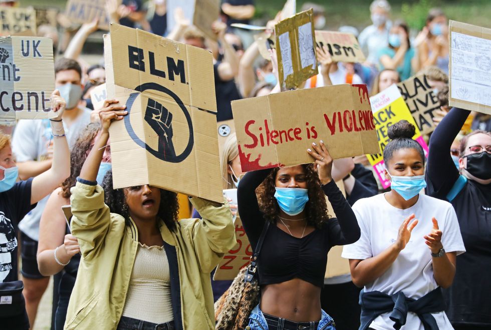 People take part in a Black Lives Matter protest in Brighton, sparked by the death of George Floyd, who was killed on May 25 while in police custody in the US city of Minneapolis.