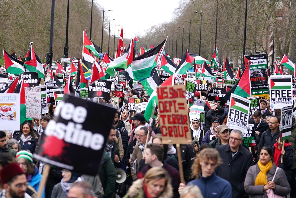 People take part in a pro-Palestine march in central London, organised by the Palestine Solidarity Campaign
