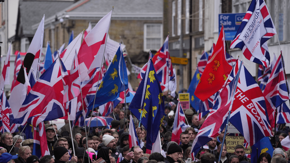 People take part in a protest in Crowborough, East Sussex, after the first 27 illegal migrants were moved into Crowborough Training Camp