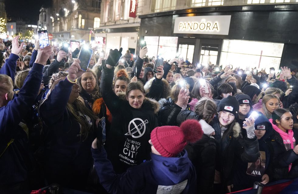 People take part in a vigil in Liverpool city centre for 12-year-old Ava White, who was fatally stabbed on Thursday, November 25, following a Christmas lights switch on. Picture date: Saturday December 4, 2021.