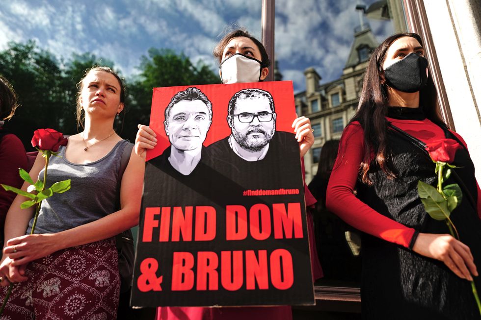 People take part in a vigil outside the Brazilian Embassy in London for Dom Phillips and Bruno Araujo Pereira, a British journalist and an Indigenous affairs official who are missing in the Amazon. Picture date: Thursday June 9, 2022.