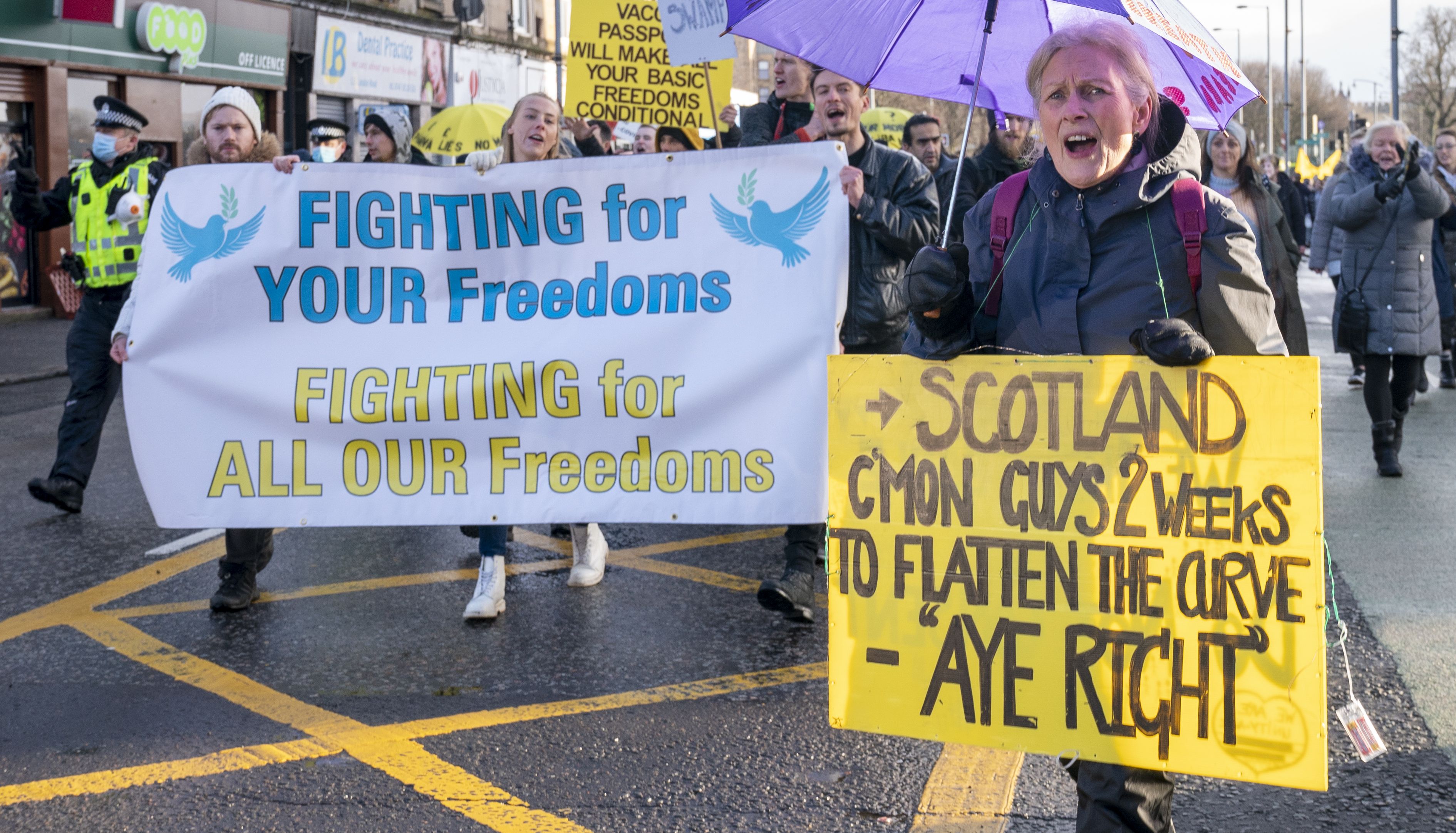 People take part in the %22Freedom Rally%22 an anti-lockdown demonstration organised by the campaign group 'Scotland Against Lockdown' in Glasgow city centre.