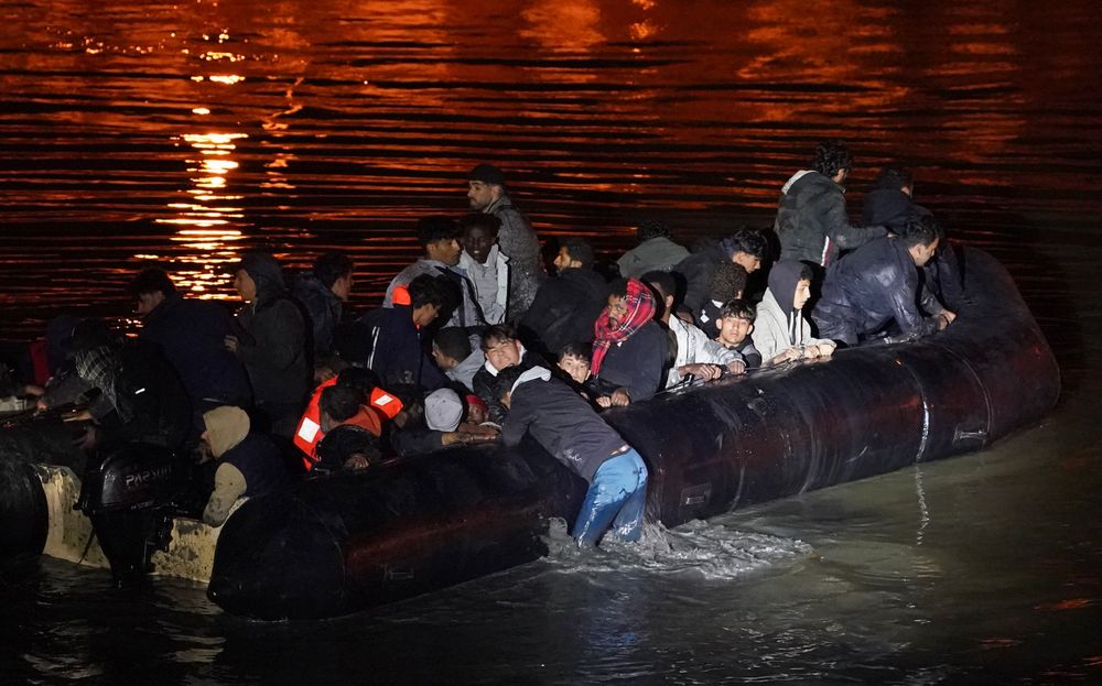 people-thought-to-be-migrants-successfully-launch-a-small-boat-from-a-riverbank-in-gravelines-france.jpg?id=61625654&width=1000&quality=90