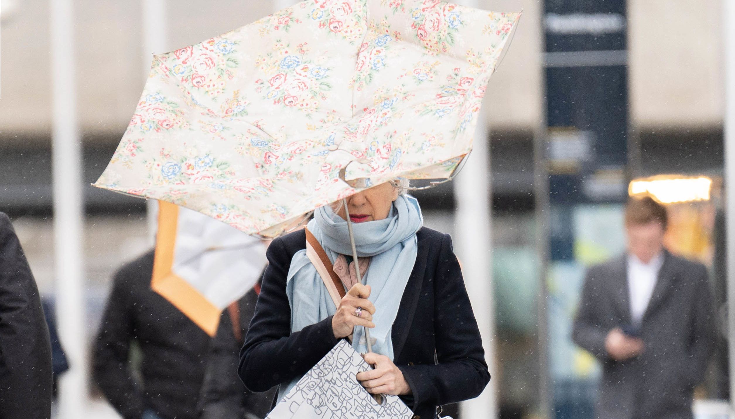 People walk through Little Venice, London. November got off to a wet and windy start as parts of the UK felt the effects of a storm in France. Picture date: Tuesday November 1, 2022.