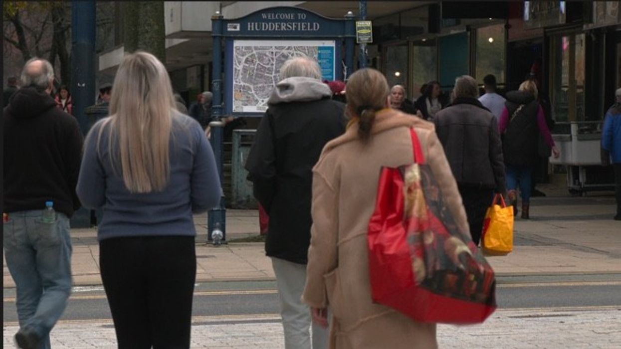 People walking down a high street