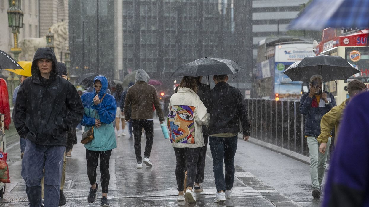 People walking in the rain in London