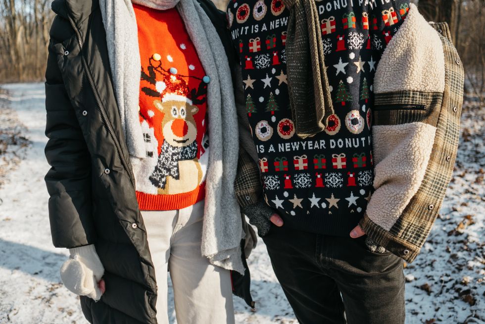 People wearing Christmas jumpers