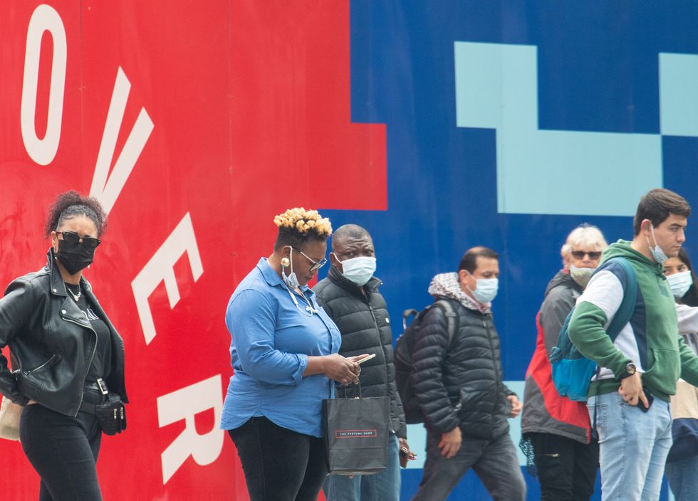People wearing face masks in central London.