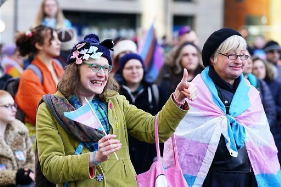 People with transgender flags