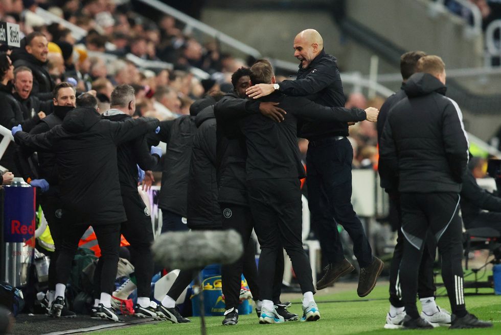 Pep Guardiola, an animated figure all night, celebrated wildly after Man City scored a third