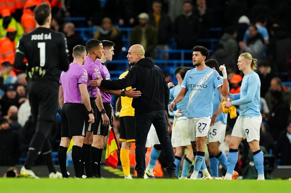 Pep Guardiola had words with referee Farai Hallam after City's win over Wolves