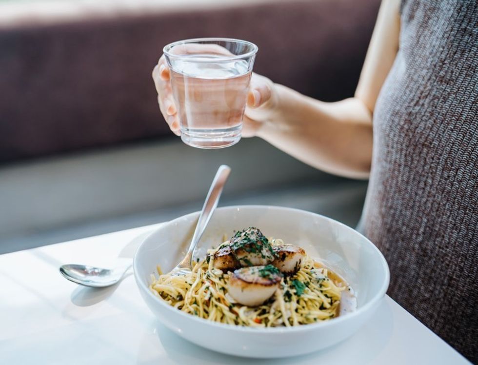 PERSON DRINKING WATER