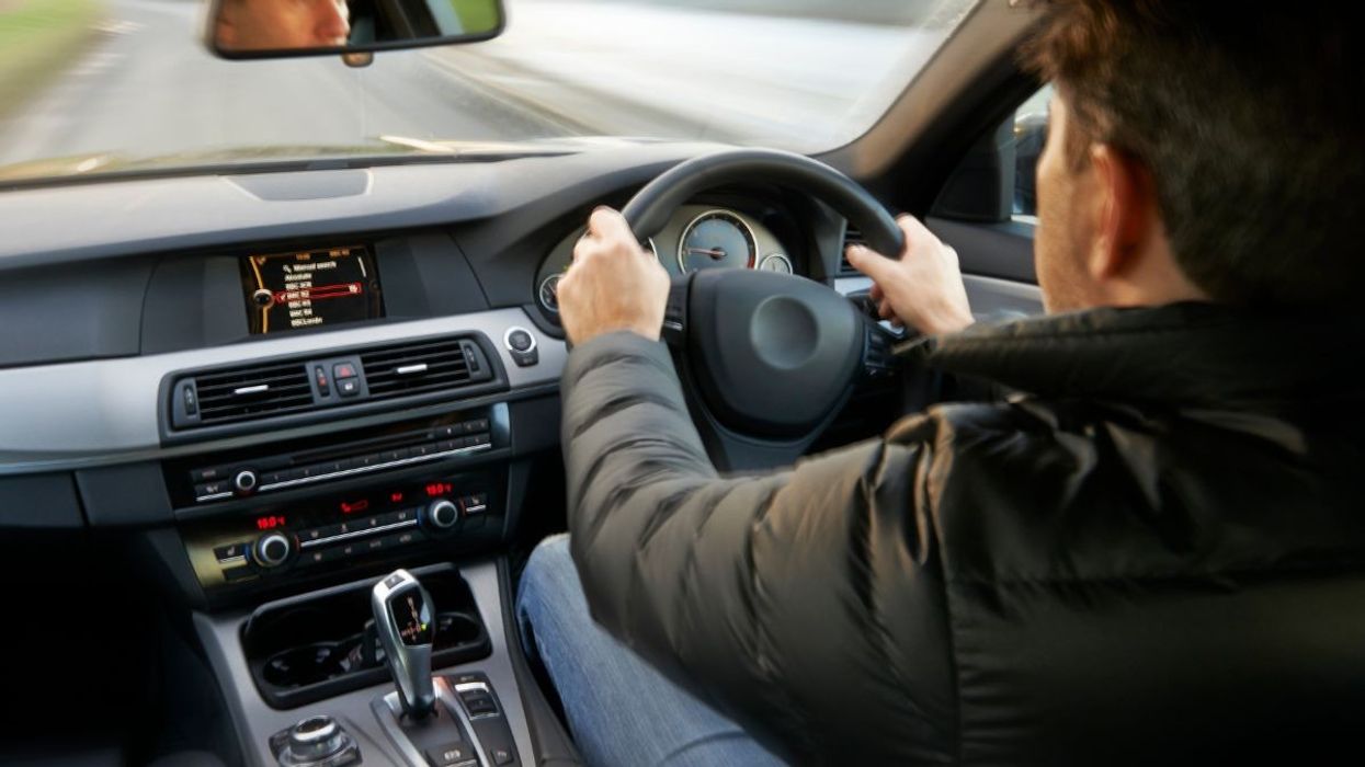 Person driving a car