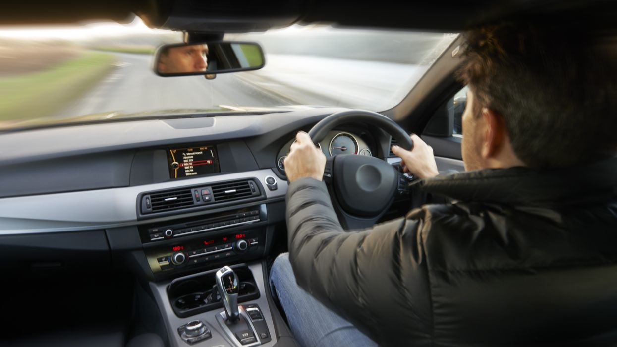 PERSON DRIVING IN A CAR