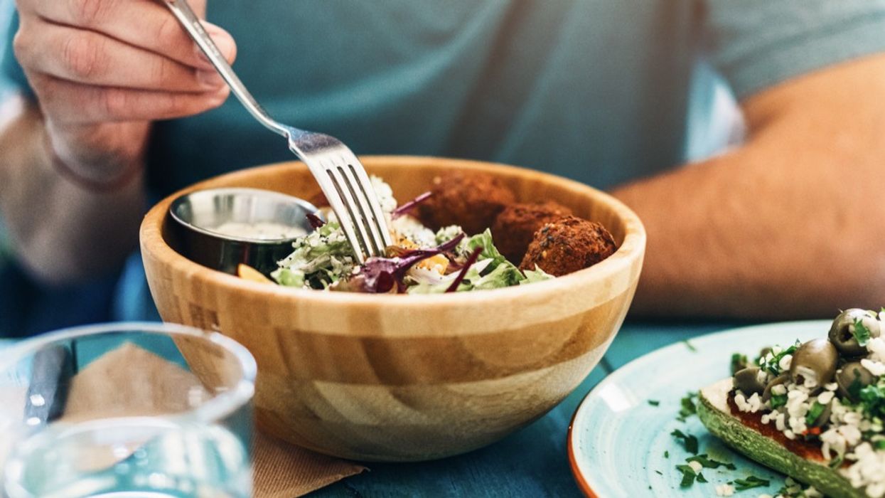 Person eating vegetarian meal