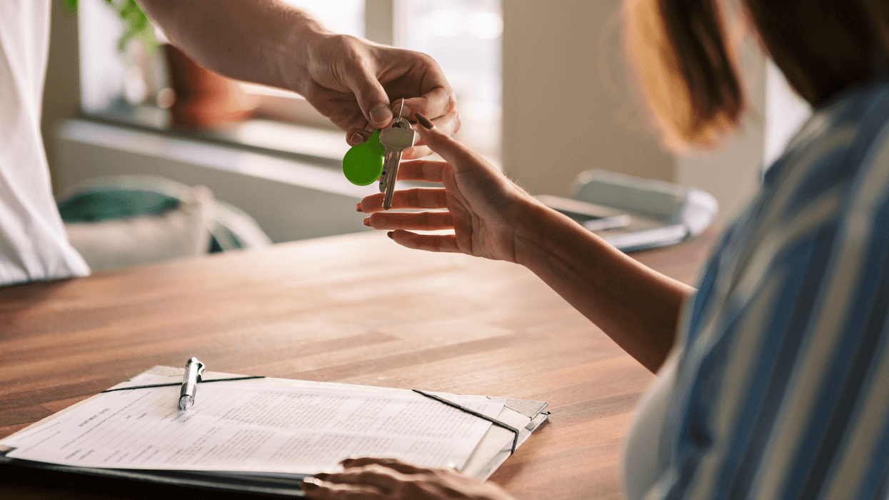 Person getting handed property keys