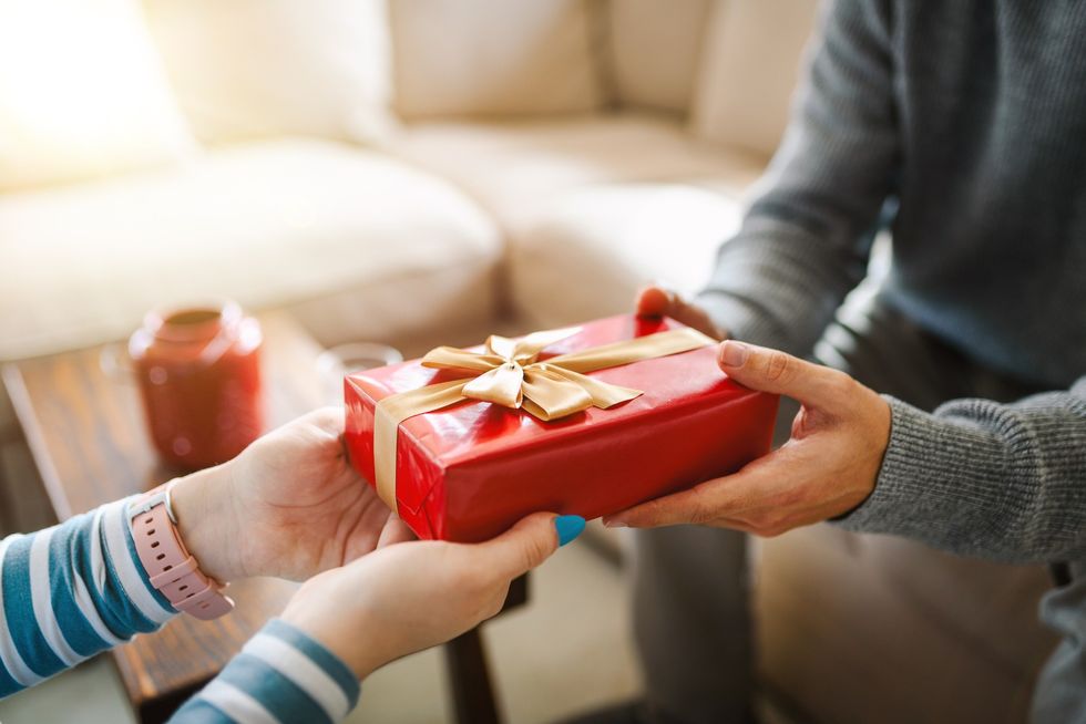 Person giving a gift