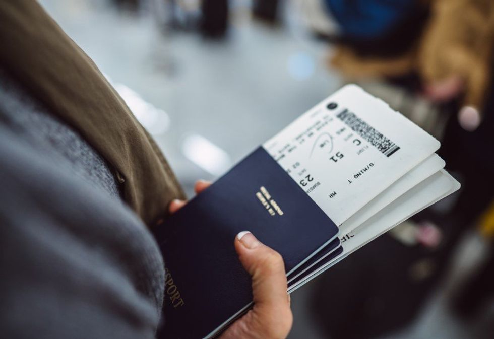 Person holding boarding pass