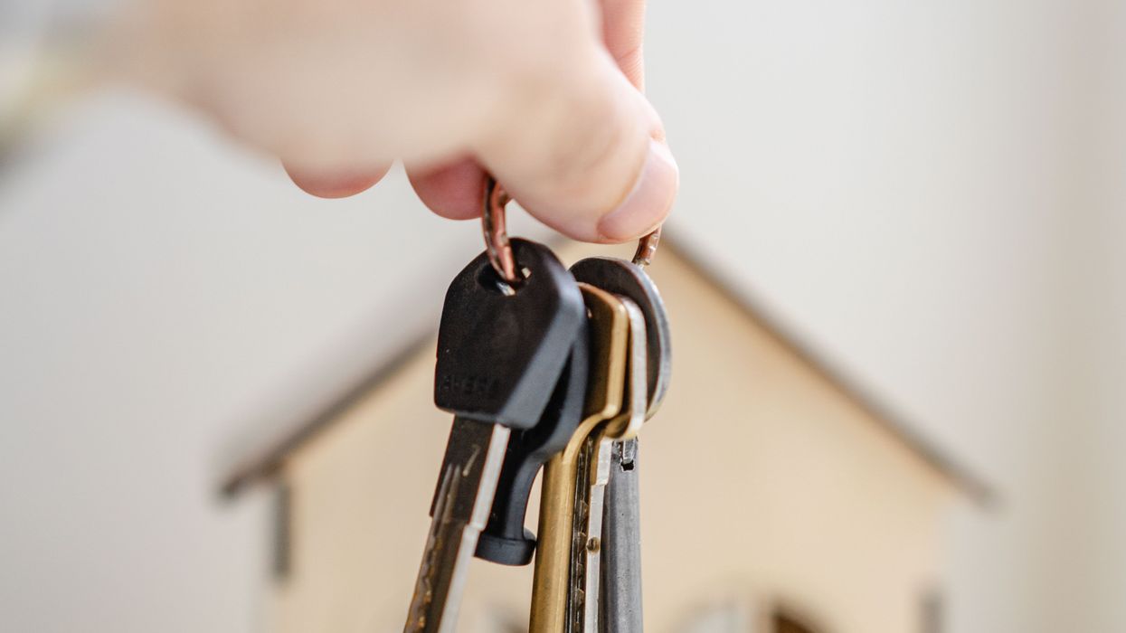 Person holding house keys