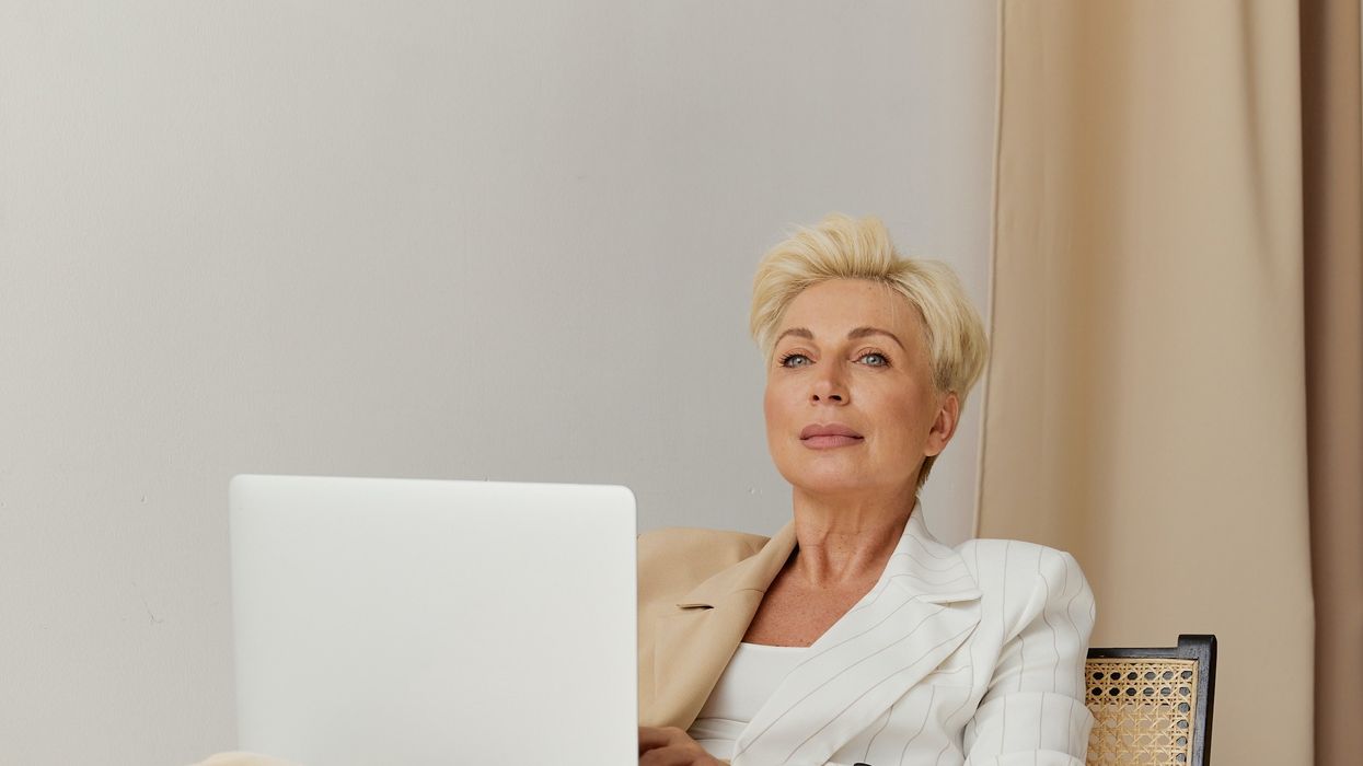 Person holding laptop