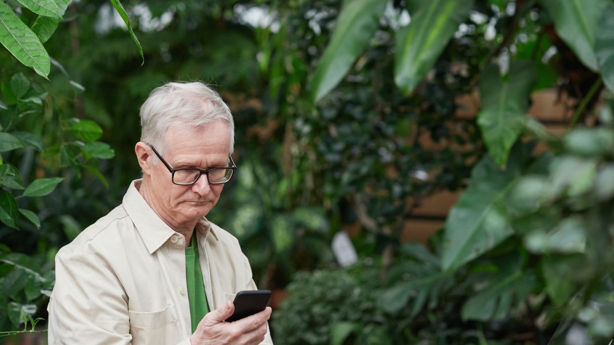 Person looking worried at their phone