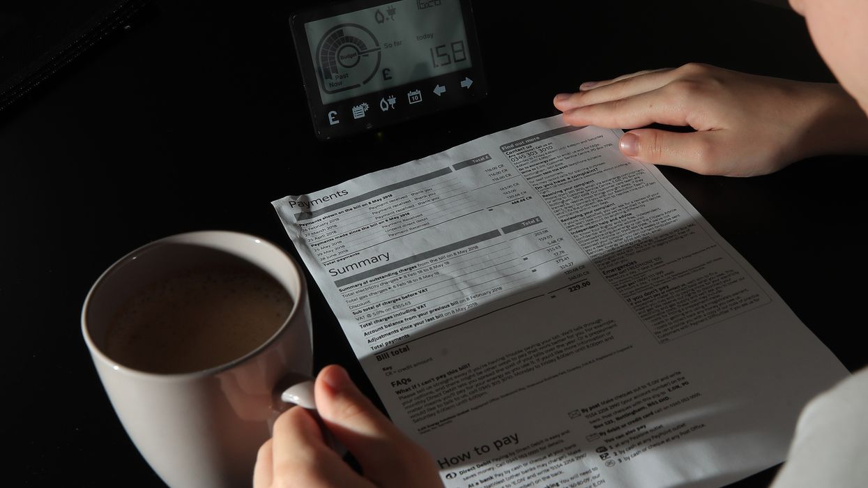 Person looks at energy bills